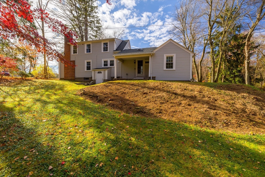 85 Franklin Road Longmeadow, MA 01106 - Photo 5 of 32 a view of a house with a yard covered with snow