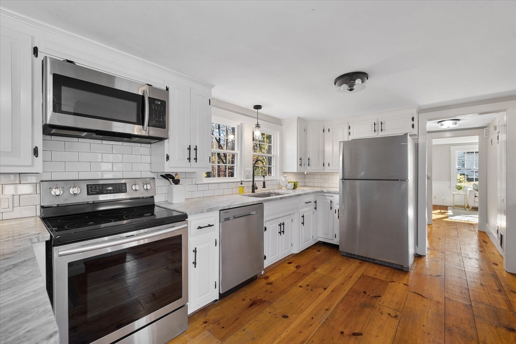 85 Franklin Road Longmeadow, MA 01106 - Photo 8 of 32 a kitchen with stainless steel appliances a stove microwave and refrigerator