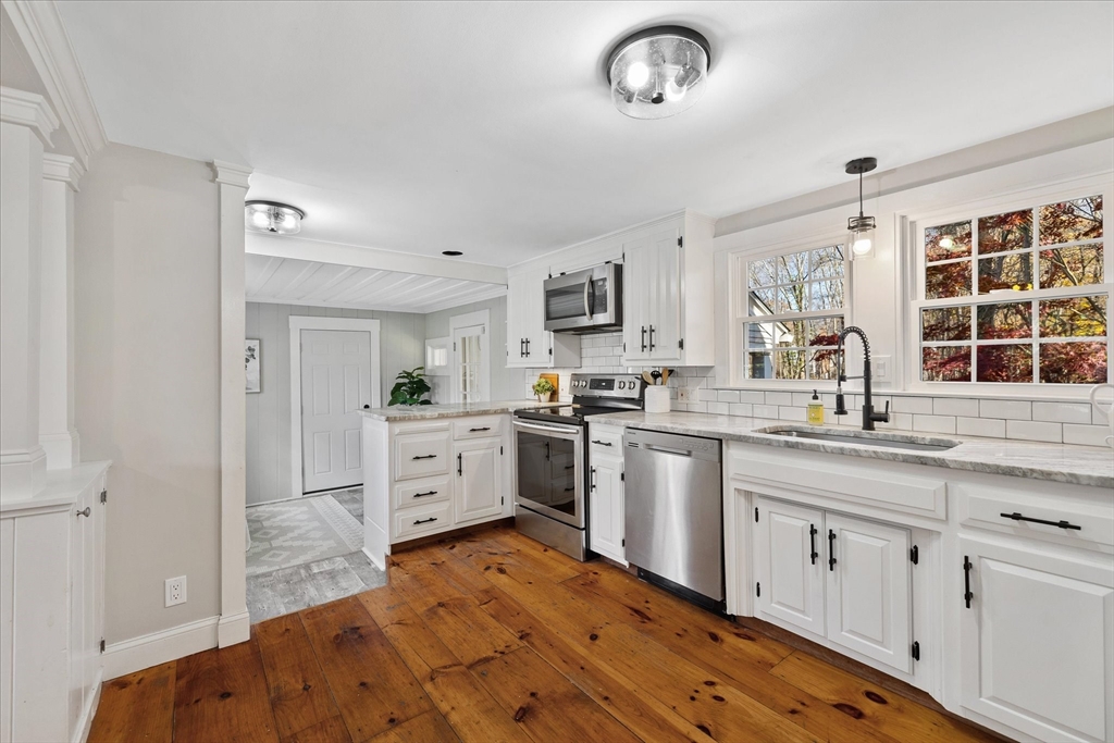 85 Franklin Road Longmeadow, MA 01106 - Photo 10 of 32 a kitchen with white cabinets and sink