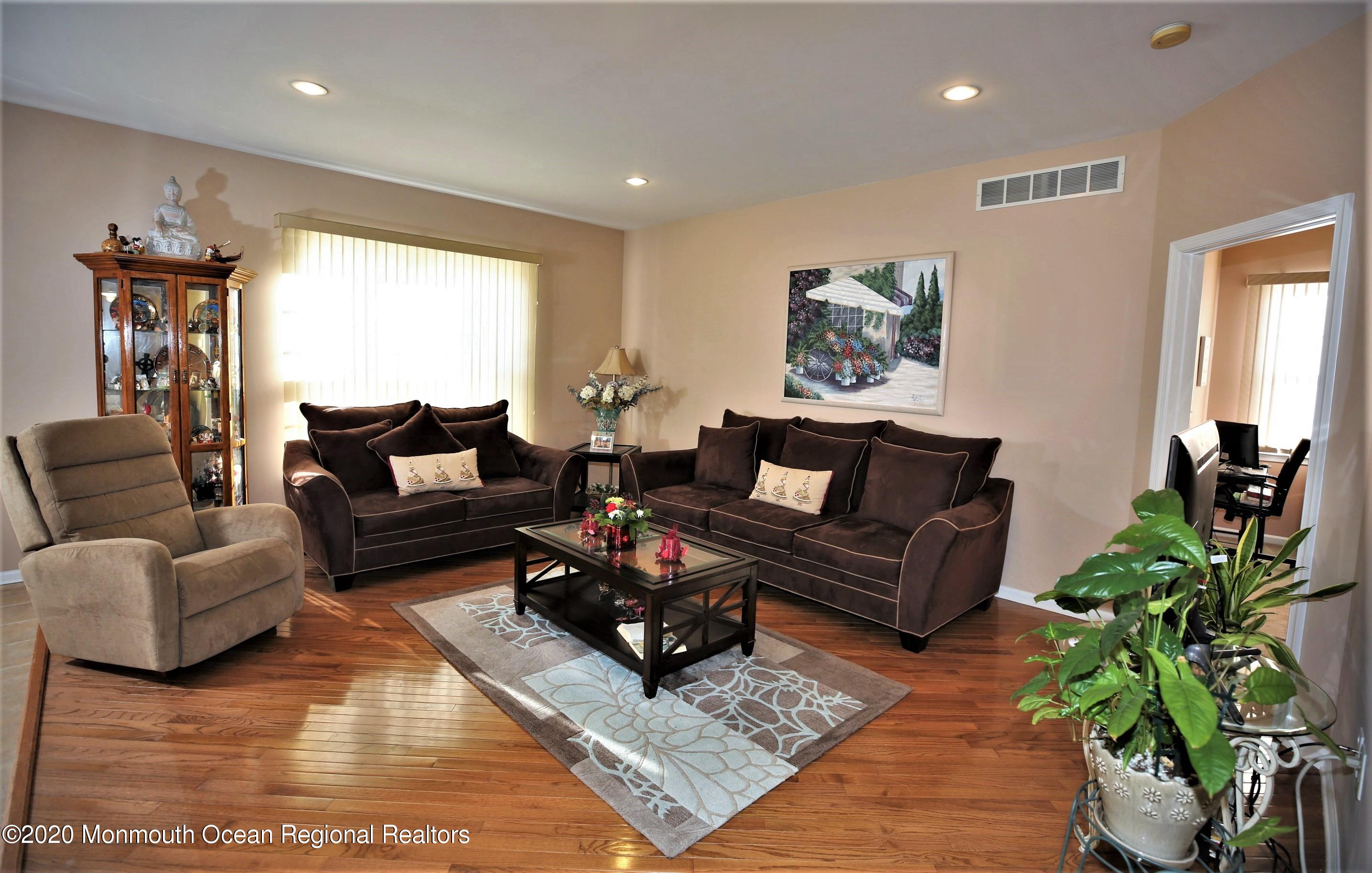 25 Byron Road Brick, NJ 08724 - Photo 13 of 35 a living room with furniture and a potted plant