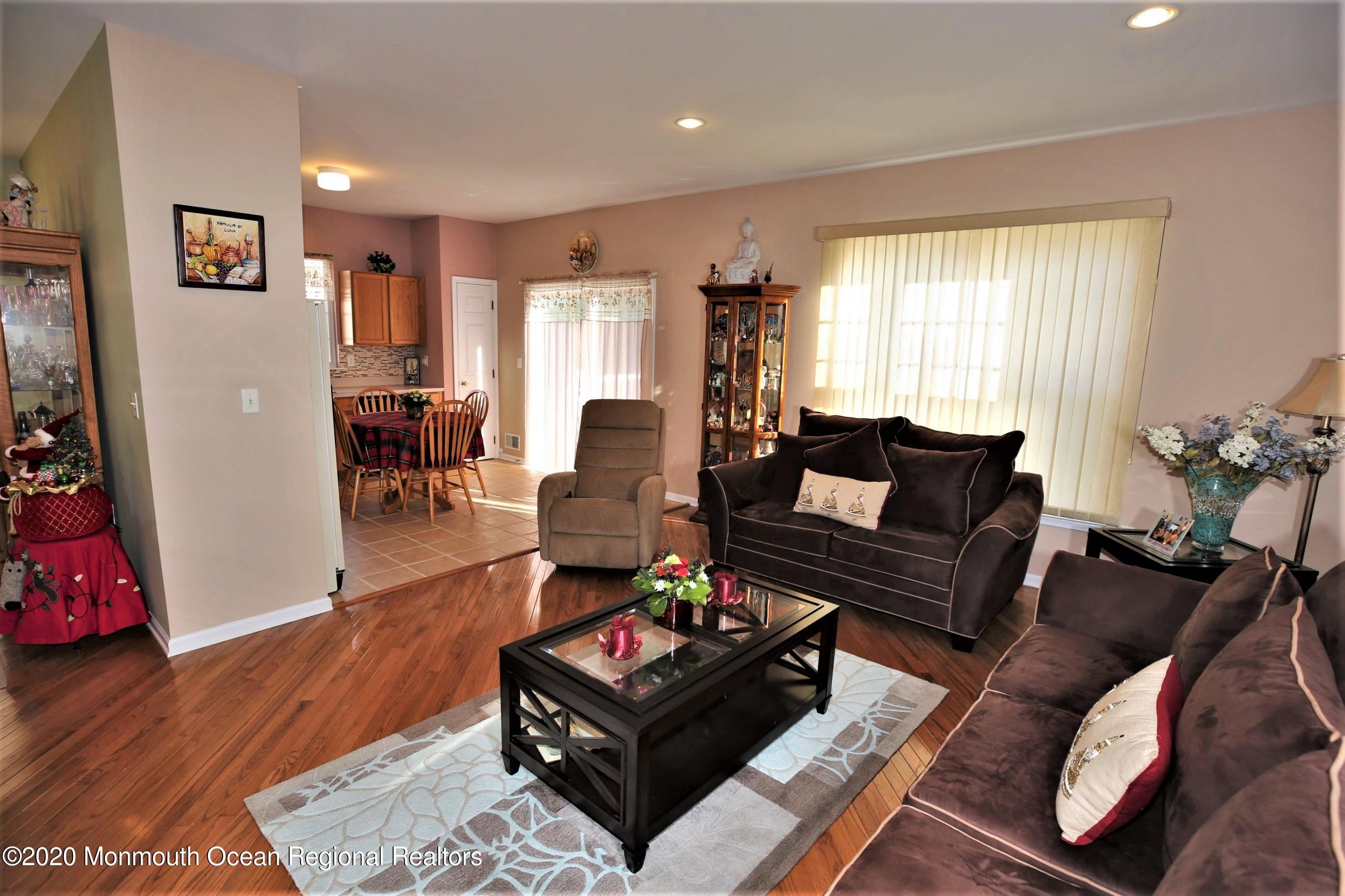 25 Byron Road Brick, NJ 08724 - Photo 15 of 35 a living room with furniture and wooden floor