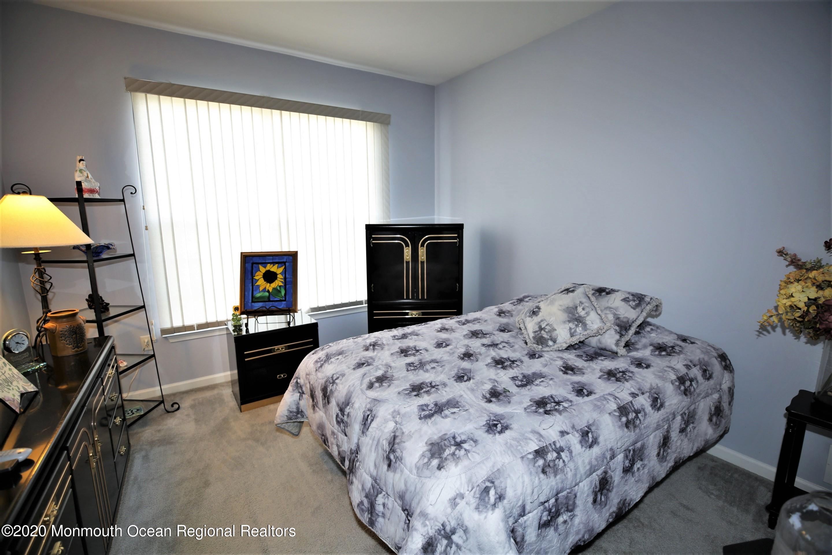 25 Byron Road Brick, NJ 08724 - Photo 26 of 35 a bedroom with a bed and a tv