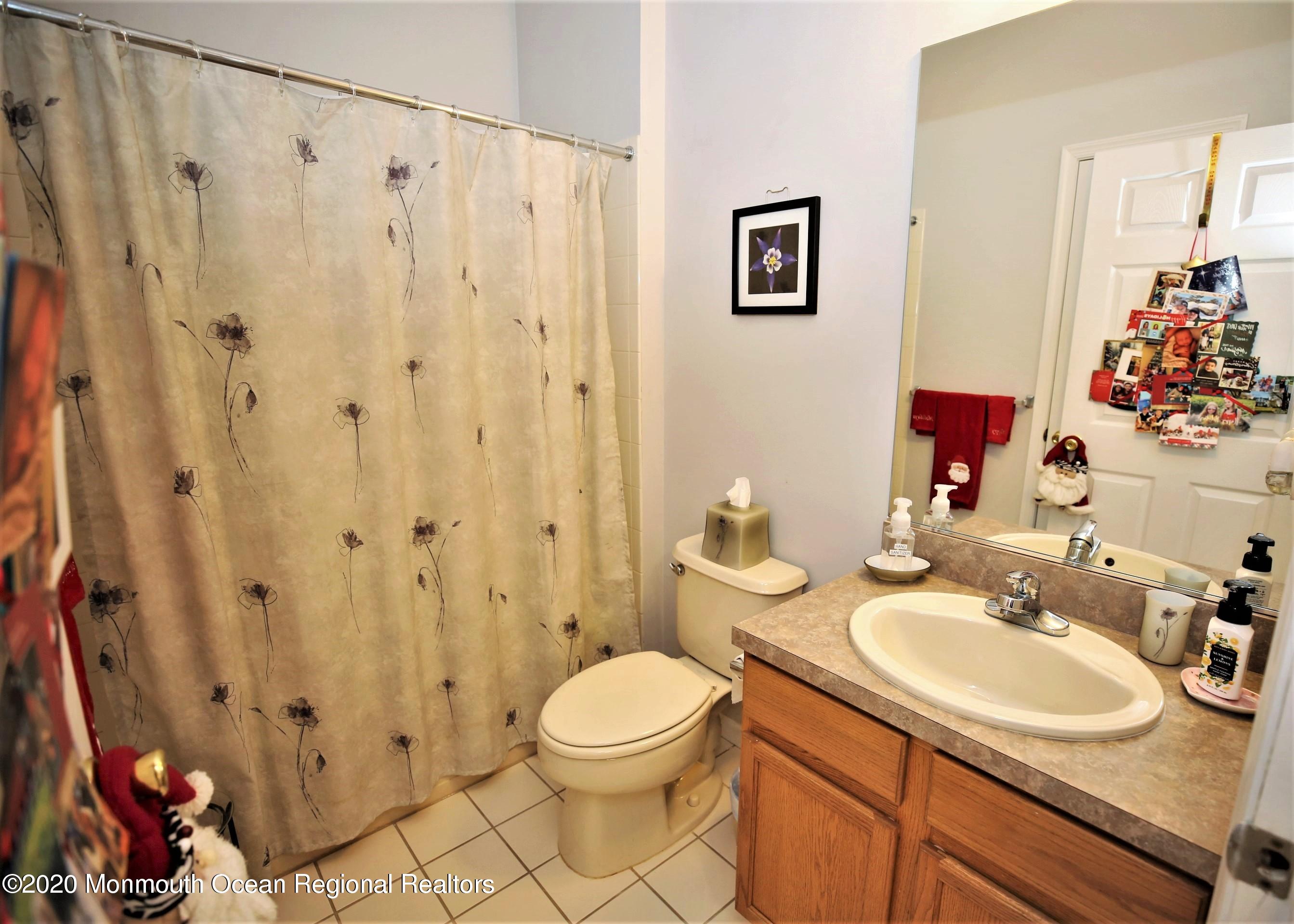 25 Byron Road Brick, NJ 08724 - Photo 28 of 35 a bathroom with a sink toilet and shower