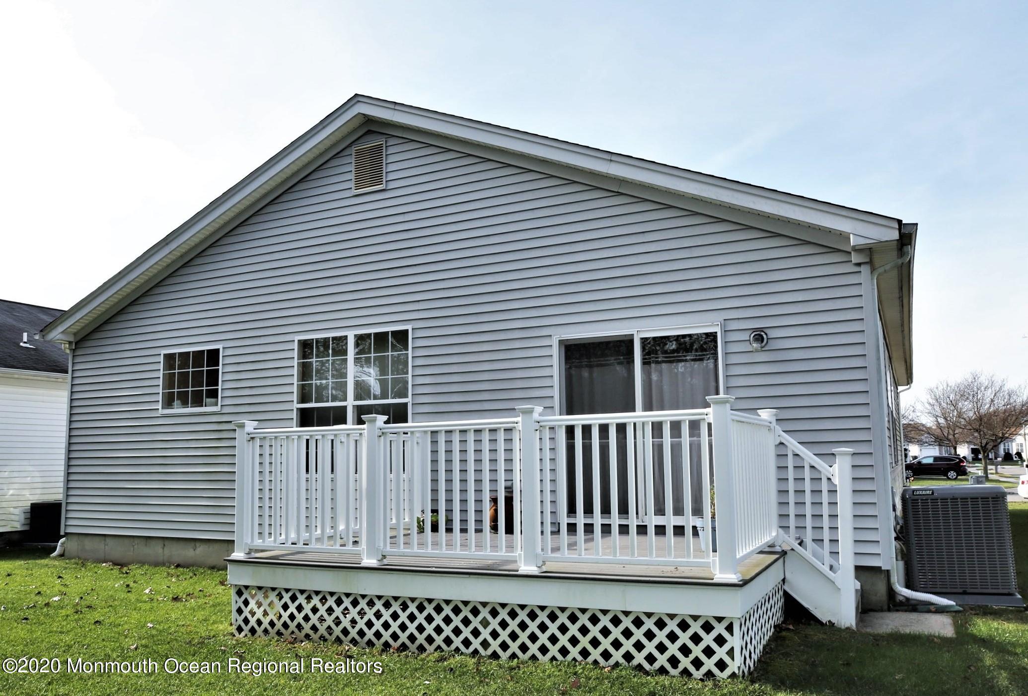 25 Byron Road Brick, NJ 08724 - Photo 4 of 35 a view of a house with a deck