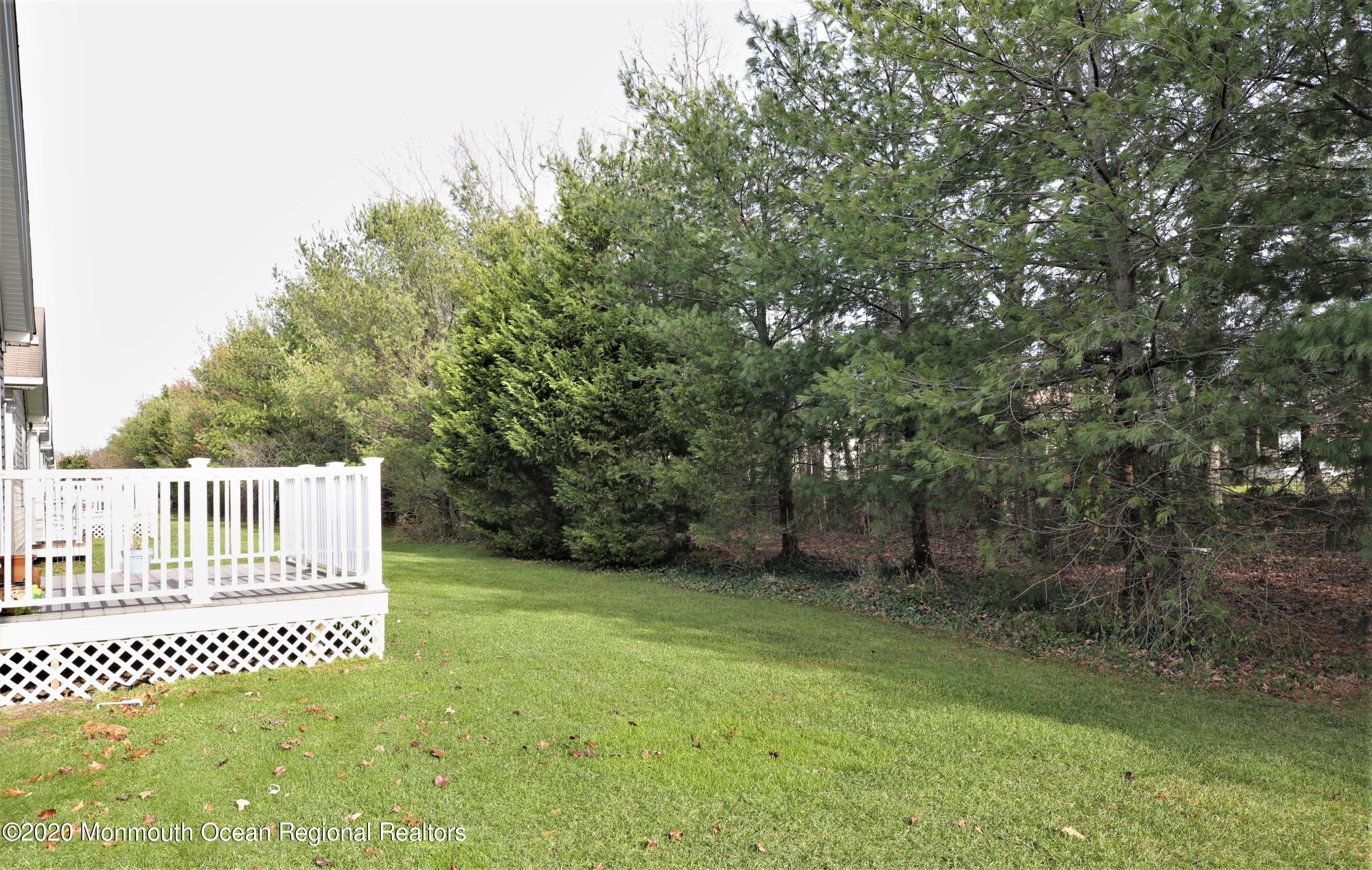 25 Byron Road Brick, NJ 08724 - Photo 6 of 35 a view of garden with wooden fence
