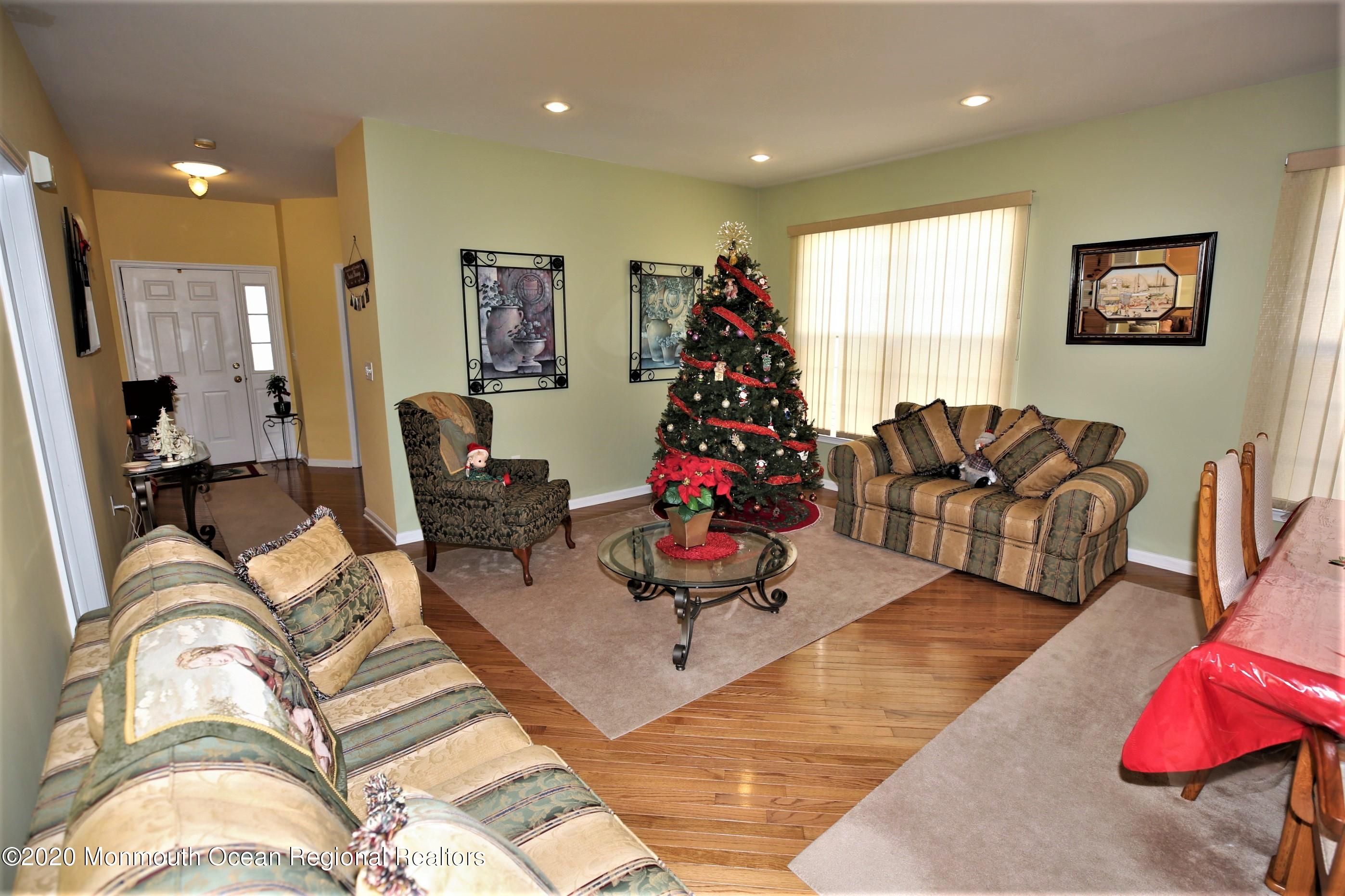 25 Byron Road Brick, NJ 08724 - Photo 10 of 35 a living room with furniture or couch and a flat screen tv