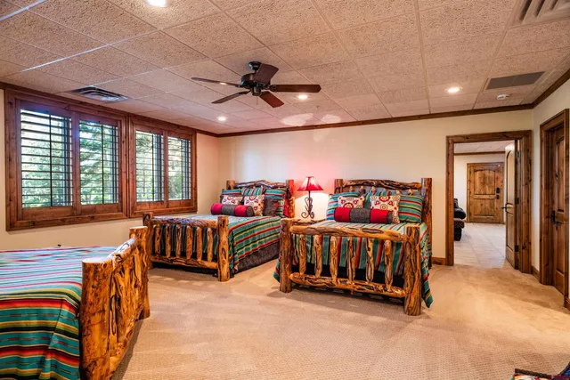 a bed room with a bed and a window