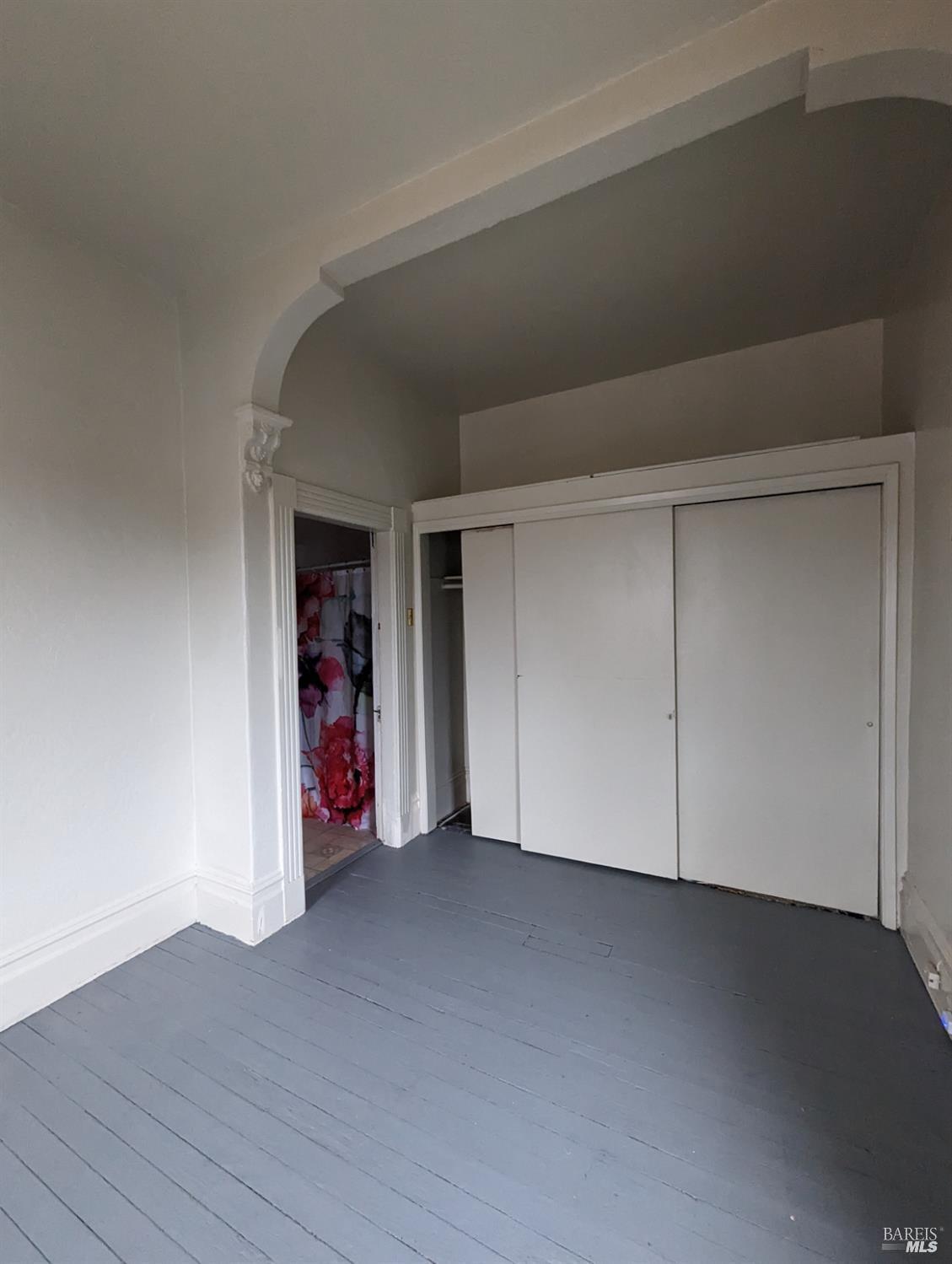 1547 4th Street, Unit A San Rafael, CA 94901 - Photo 58 of 64 a view of empty room with wooden floor