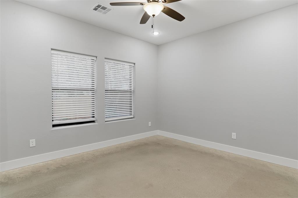 116 Harrison Street Denison, TX 75021 - Photo 15 of 25 Unfurnished room with concrete flooring and a ceiling fan