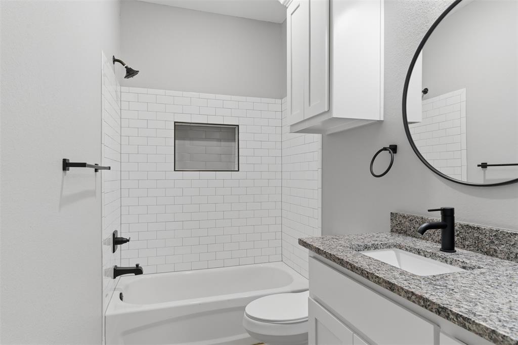 116 Harrison Street Denison, TX 75021 - Photo 20 of 25 Full bath featuring shower / bath combination and vanity