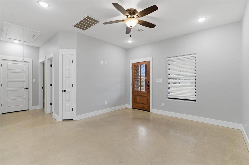 116 Harrison Street Denison, TX 75021 - Photo 2 of 25 Foyer entrance featuring concrete floors, ceiling fan, and recessed lighting