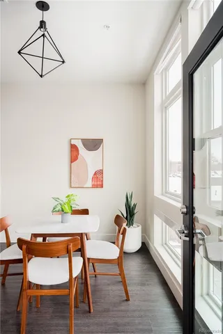 a workspace with furniture and window