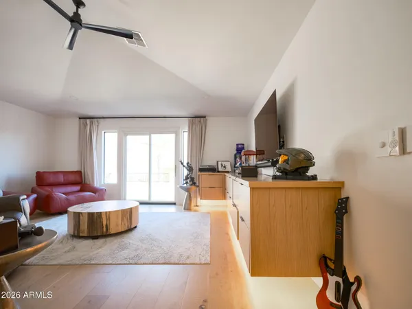 a kitchen with a refrigerator and countertop