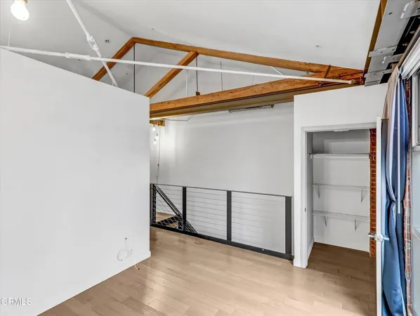 a view of a room with rack on the wall