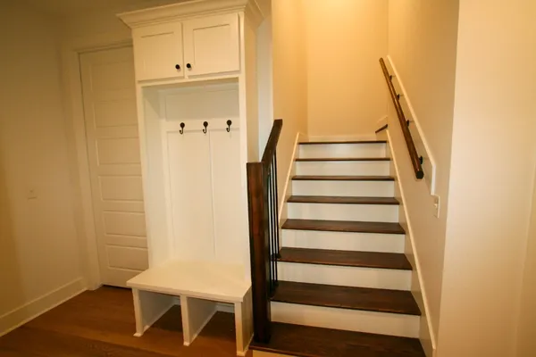 a view of entryway with wooden floor