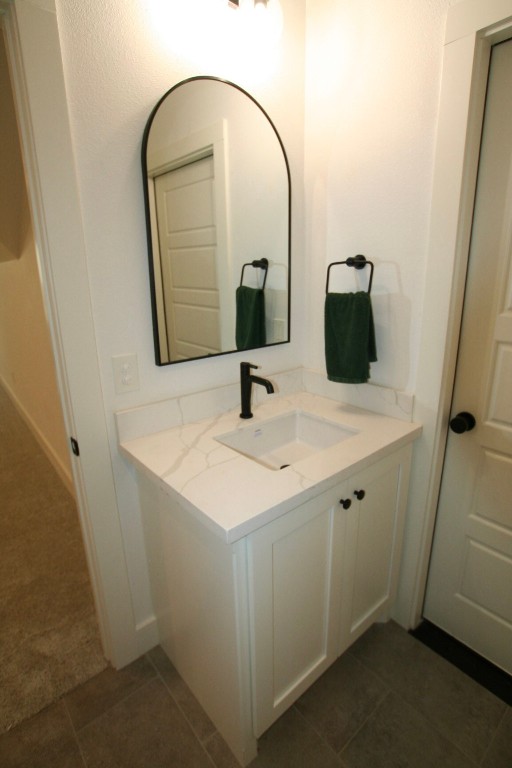 455 East Walton Road Lumberton, TX 77657 - Photo 16 of 31 a bathroom with a sink and a mirror