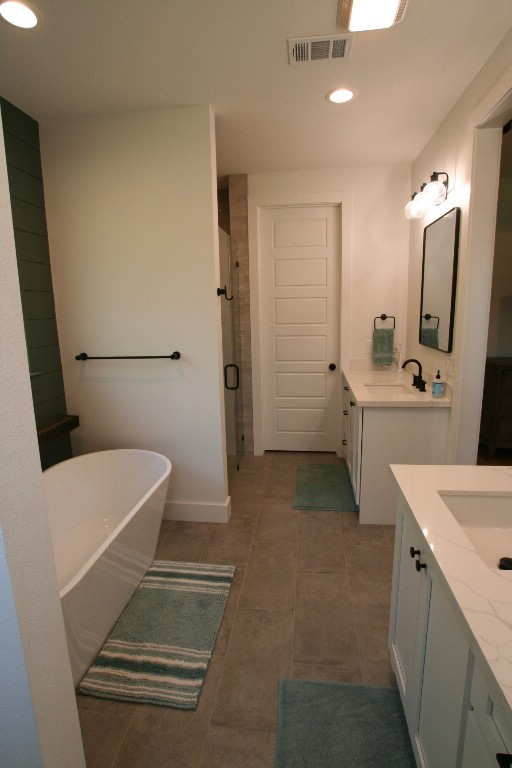 455 East Walton Road Lumberton, TX 77657 - Photo 18 of 31 a bathroom with a sink a toilet a mirror and shower