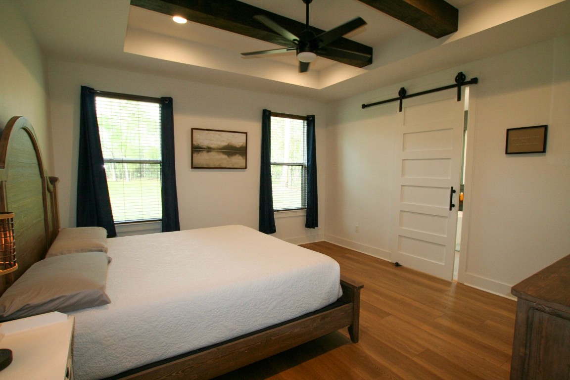 455 East Walton Road Lumberton, TX 77657 - Photo 22 of 31 a bedroom with a bed next to a window