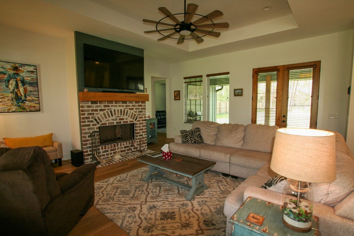 455 East Walton Road Lumberton, TX 77657 - Photo 3 of 31 a living room with furniture and a fireplace