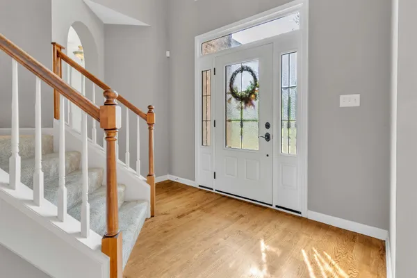 a view of a swimming pool with an outdoor space and seating area
