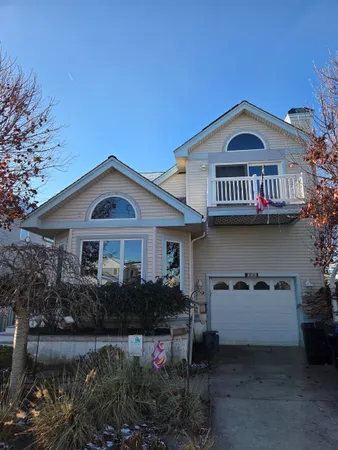 a view of a house with roof deck