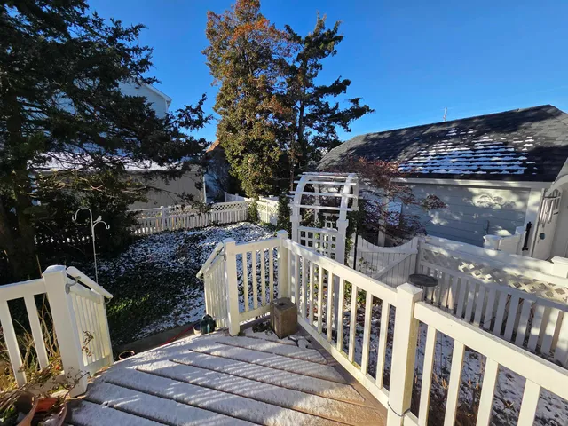 a front view of a house with a porch