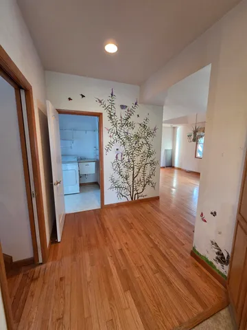 a view of livingroom with furniture and wooden floor
