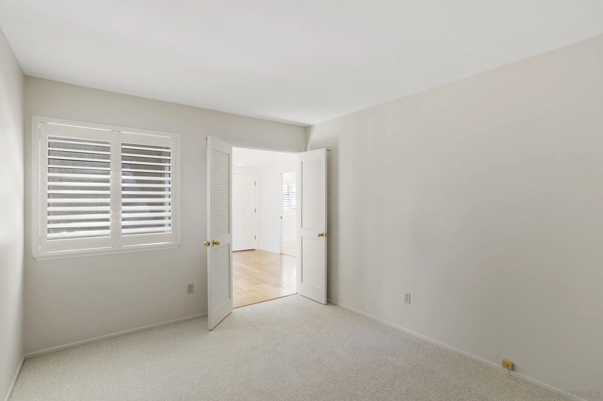 541 Cloudview Lane Encinitas, CA 92024 - Photo 21 of 25 a view of an empty room with a window