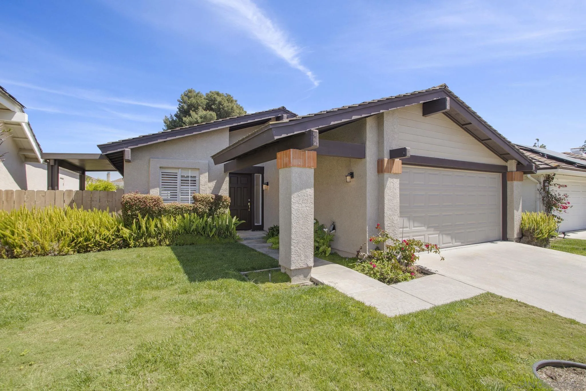 541 Cloudview Lane Encinitas, CA 92024 - Photo 25 of 25 a front view of a house with a yard and garage