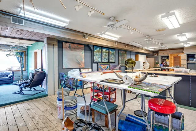 a outdoor space with lots of furniture and chairs