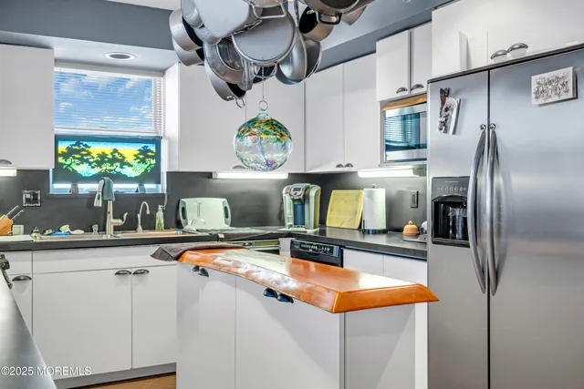 a dining room with a table and chairs