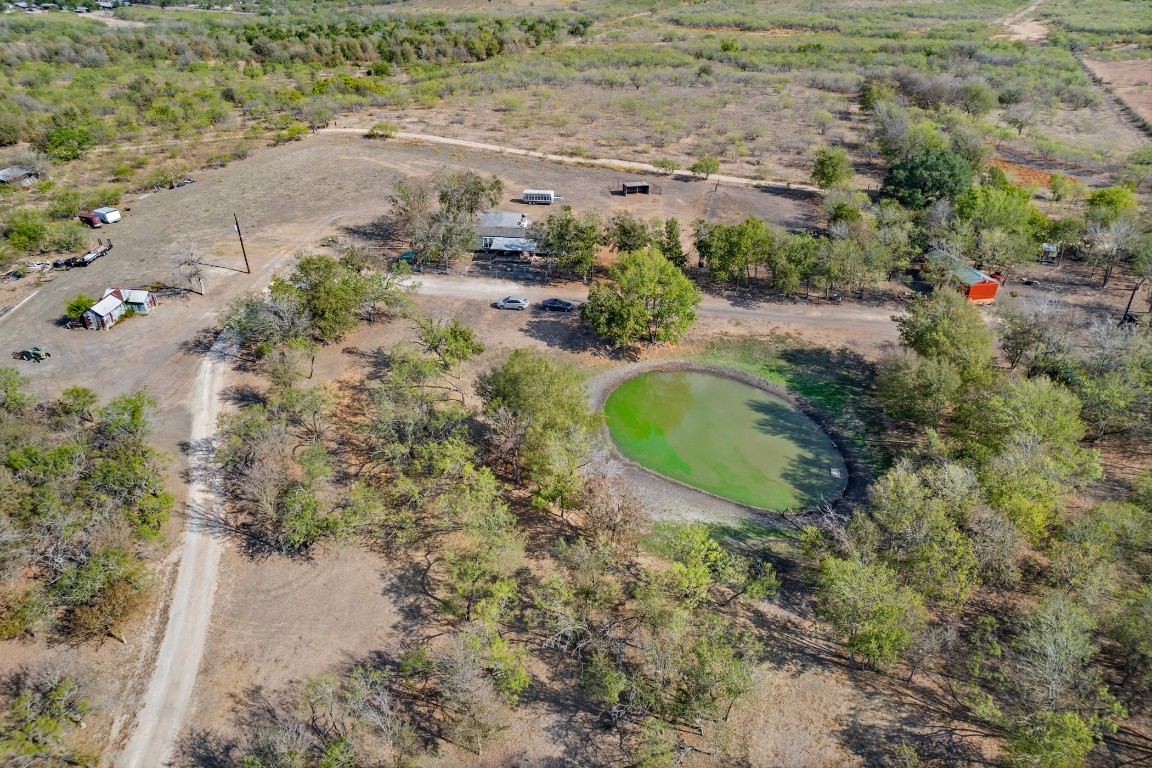 13800 Hokanson Road Del Valle, TX 78617 - Photo 11 of 16 an aerial view of a house with a swimming pool