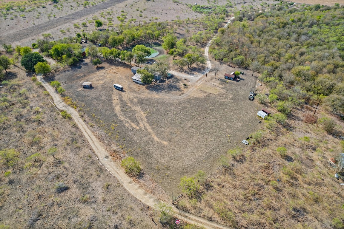 13800 Hokanson Road Del Valle, TX 78617 - Photo 12 of 16 a view of a garden with a plant