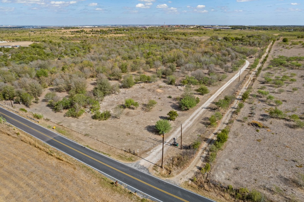 13800 Hokanson Road Del Valle, TX 78617 - Photo 15 of 16 a view of an outdoor space and a lake view