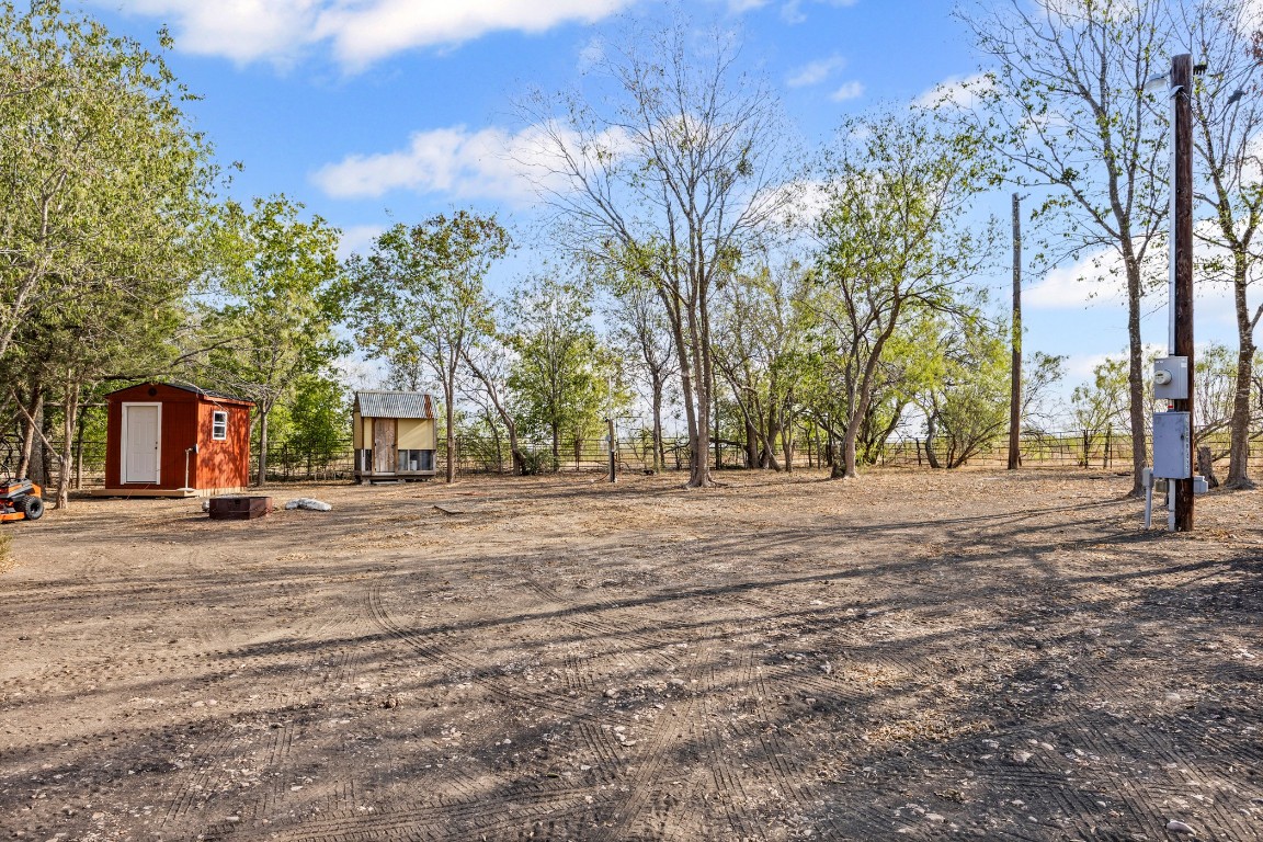 13800 Hokanson Road Del Valle, TX 78617 - Photo 6 of 16 a view of road with trees