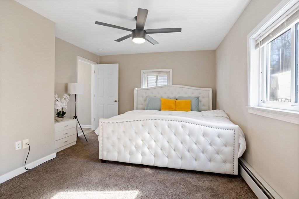 62 Union Street Gardner, MA 01440 - Photo 11 of 24 a bedroom with a bed and window