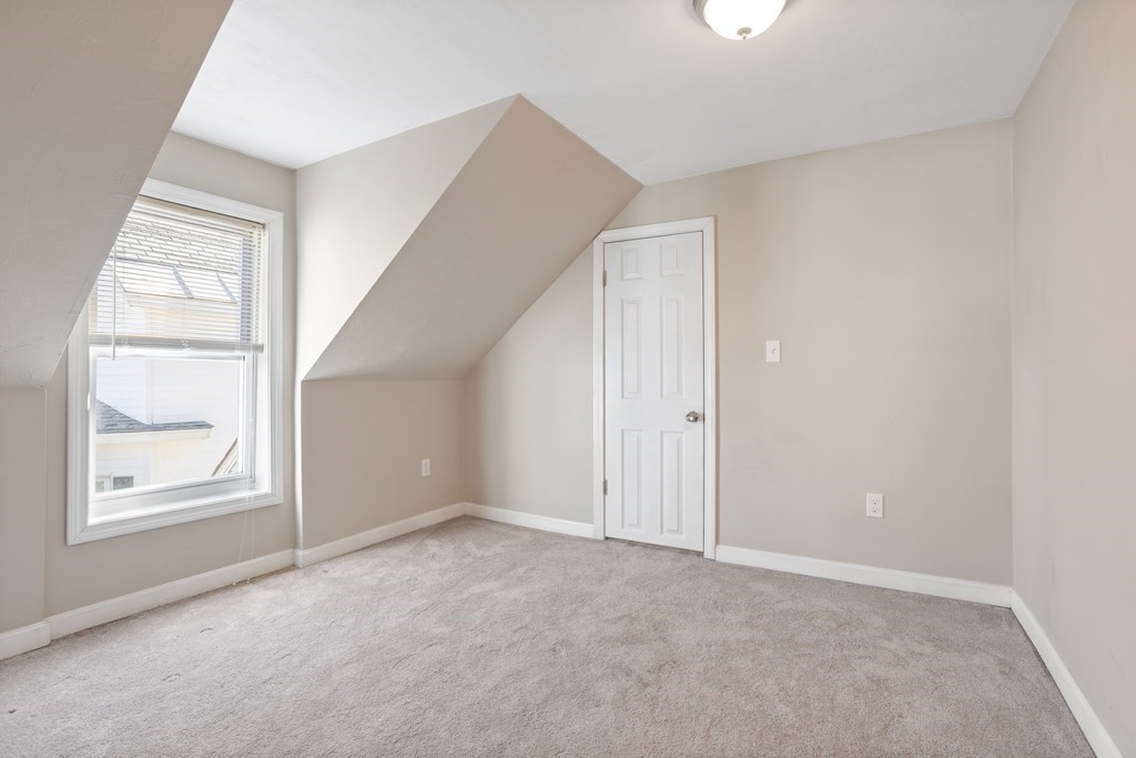 62 Union Street Gardner, MA 01440 - Photo 17 of 24 an empty room with windows and closet