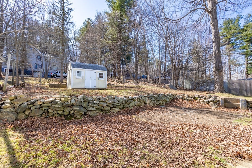 62 Union Street Gardner, MA 01440 - Photo 19 of 24 a view of a yard with a tree
