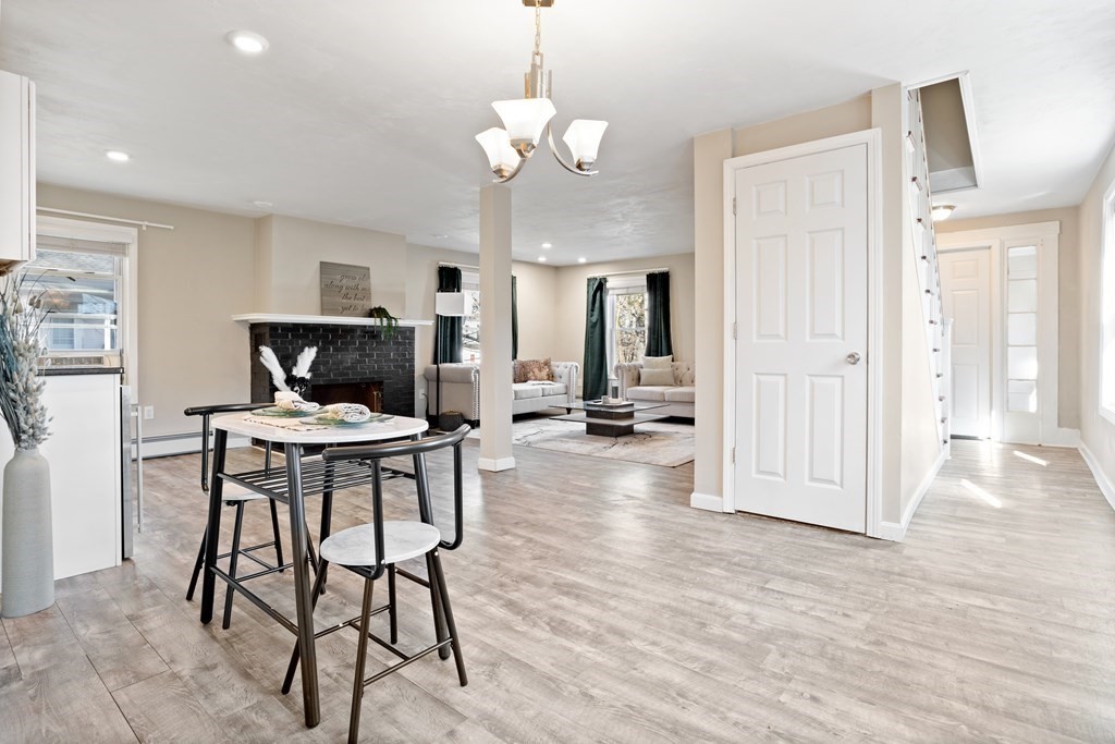 62 Union Street Gardner, MA 01440 - Photo 6 of 24 a view of a dining room with furniture and wooden floor