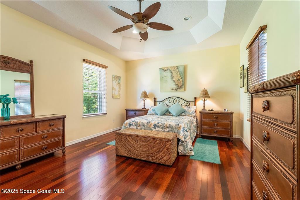 3975 Pepper Tree Street Grant, FL 32949 - Photo 15 of 36 a bedroom with a bed and a dresser