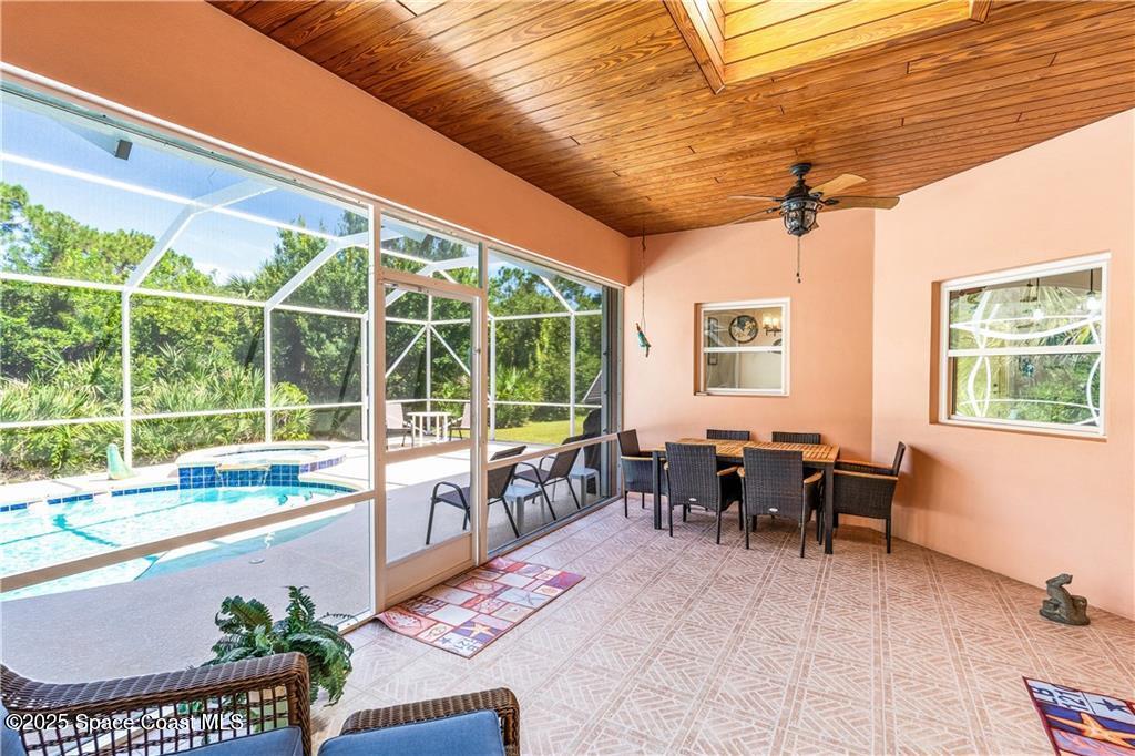 3975 Pepper Tree Street Grant, FL 32949 - Photo 23 of 36 a living room filled with furniture