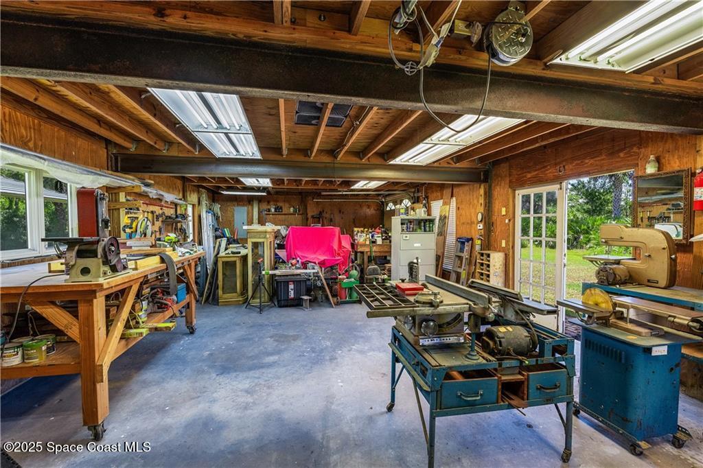 3975 Pepper Tree Street Grant, FL 32949 - Photo 33 of 36 a view of a storage room with furniture