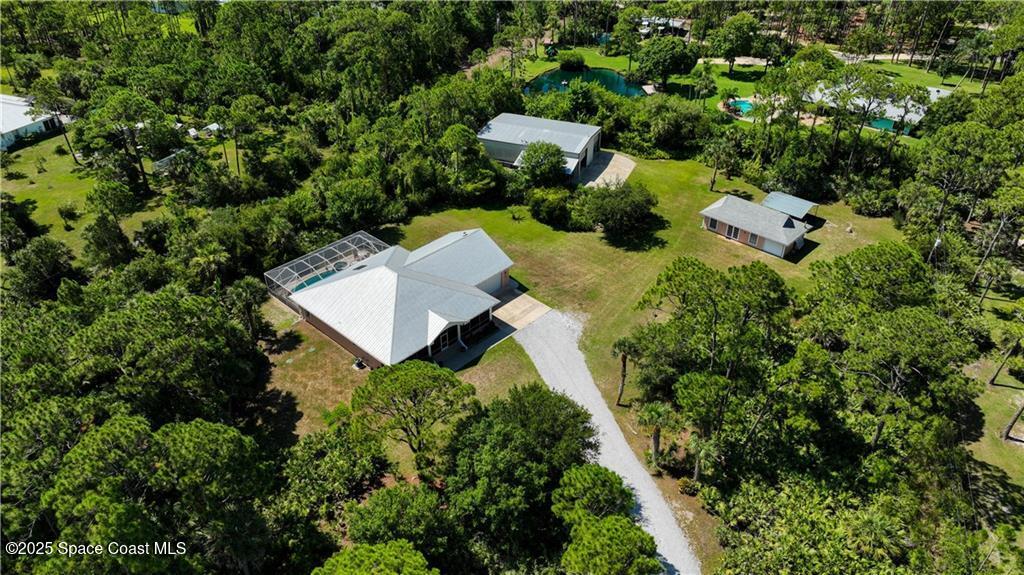 3975 Pepper Tree Street Grant, FL 32949 - Photo 34 of 36 an aerial view of house with yard