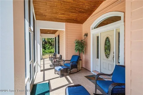 a kitchen with stainless steel appliances granite countertop a sink refrigerator stove and microwave