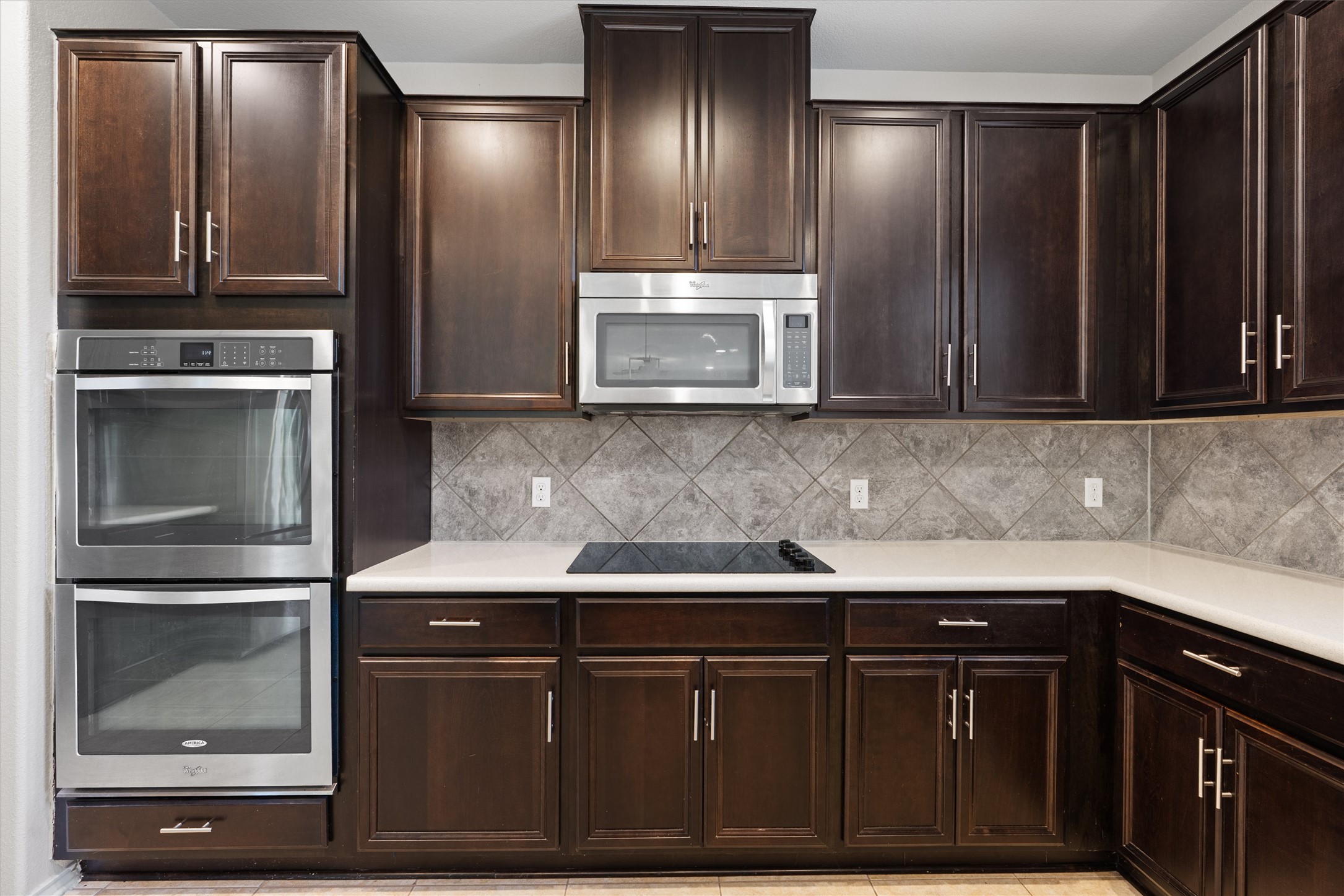 804 Water Hyacinth Loop Leander, TX 78641 - Photo 12 of 37 a kitchen with granite countertop stainless steel appliances and cabinets
