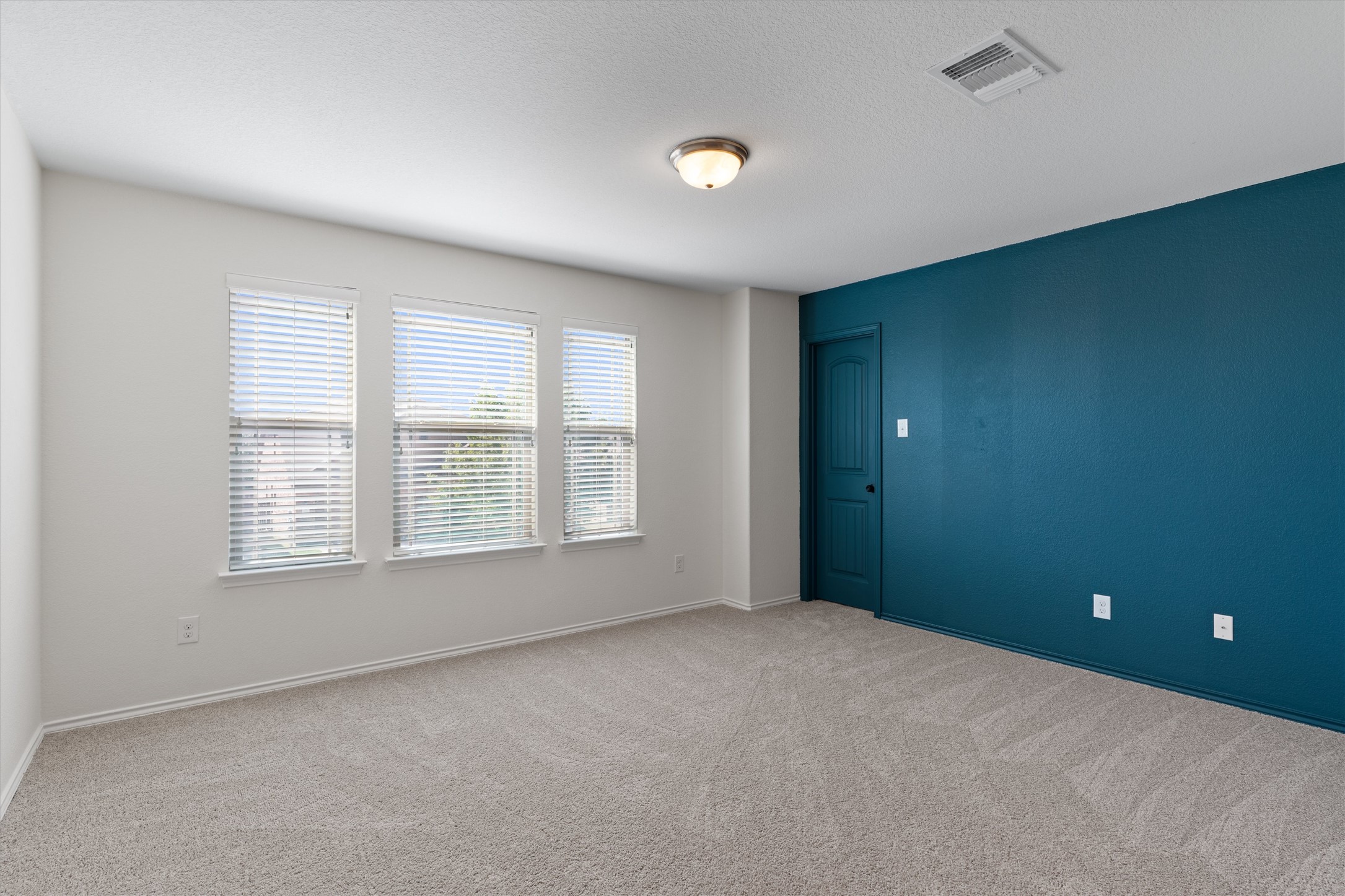 804 Water Hyacinth Loop Leander, TX 78641 - Photo 14 of 37 a view of an empty room with a window