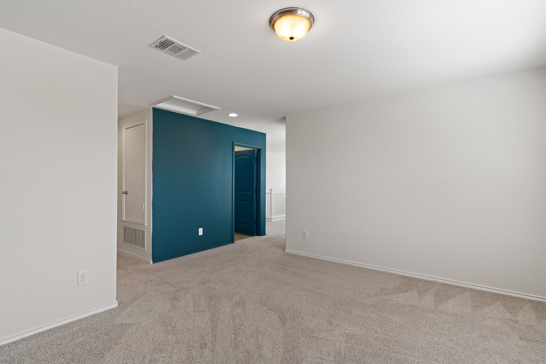 804 Water Hyacinth Loop Leander, TX 78641 - Photo 18 of 39 Natural light and neutral tones make this space feel open and inviting, while still offering a sense of separation from the rest of the home.