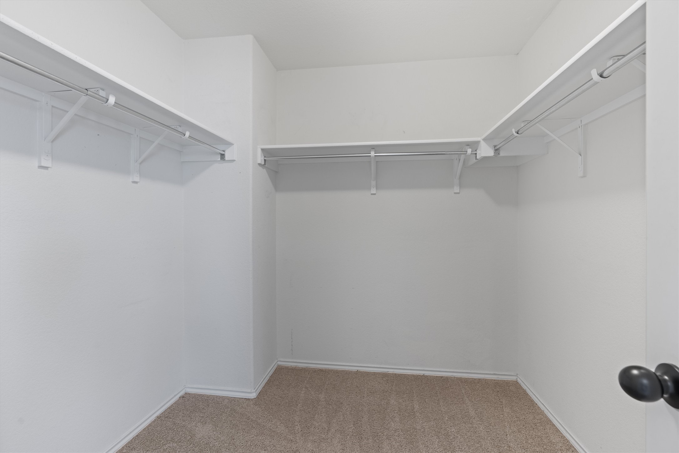 804 Water Hyacinth Loop Leander, TX 78641 - Photo 21 of 37 a view of an empty walk in closet