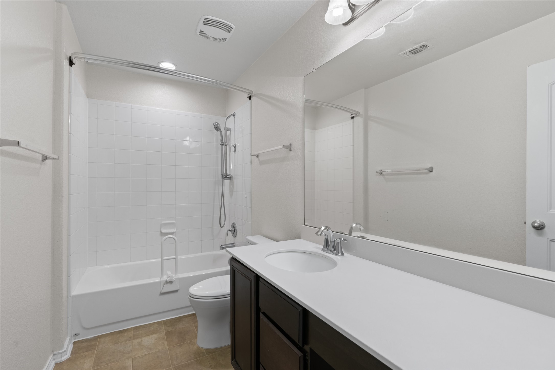 804 Water Hyacinth Loop Leander, TX 78641 - Photo 26 of 39 The secondary bathroom is ideal for guests—providing both privacy and proximity to the upstairs game room.