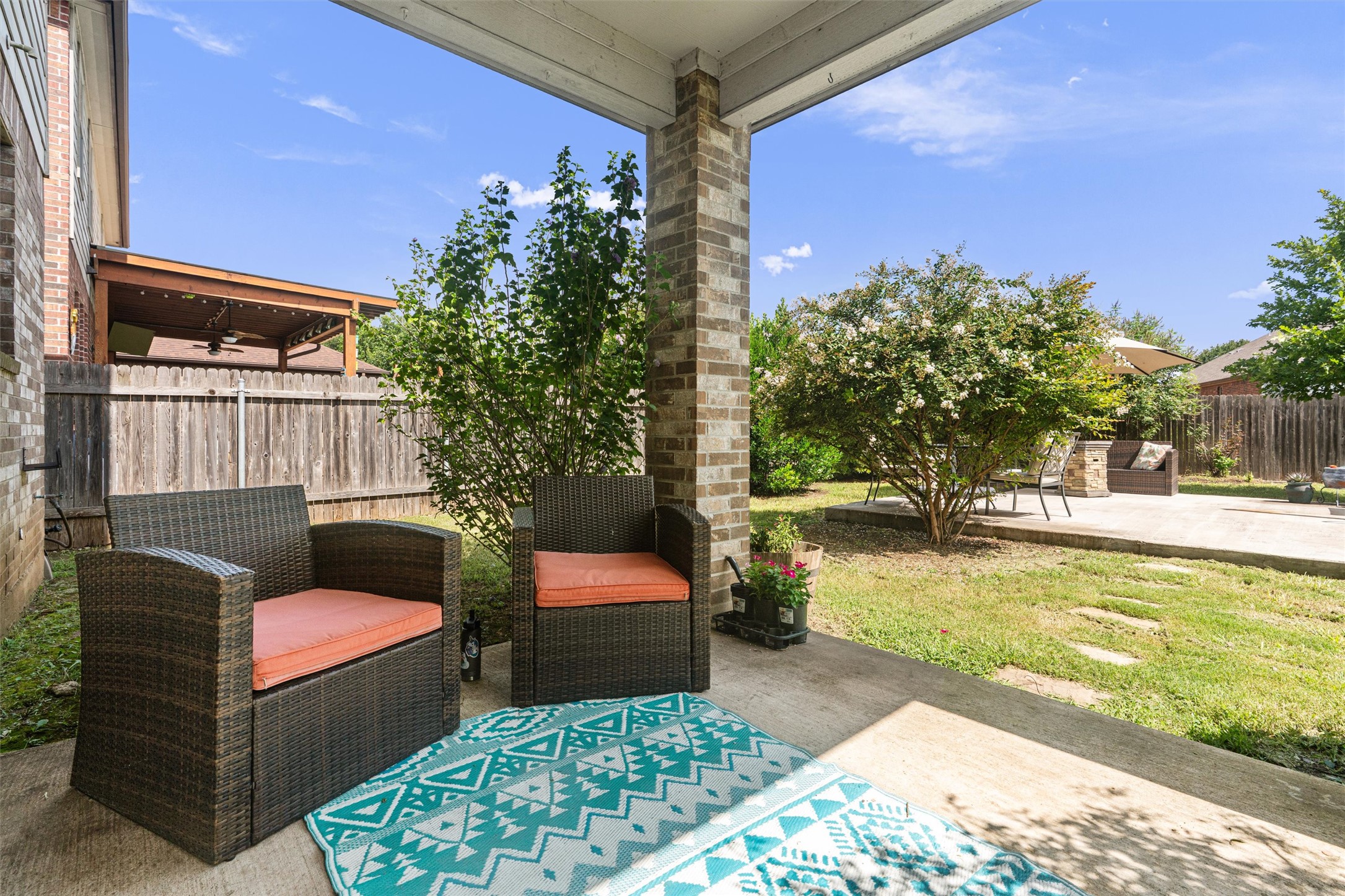 804 Water Hyacinth Loop Leander, TX 78641 - Photo 28 of 37 a house view with a sitting space fire pit and outdoor space